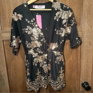 Elegant Black Blouse with Gold Floral Accents